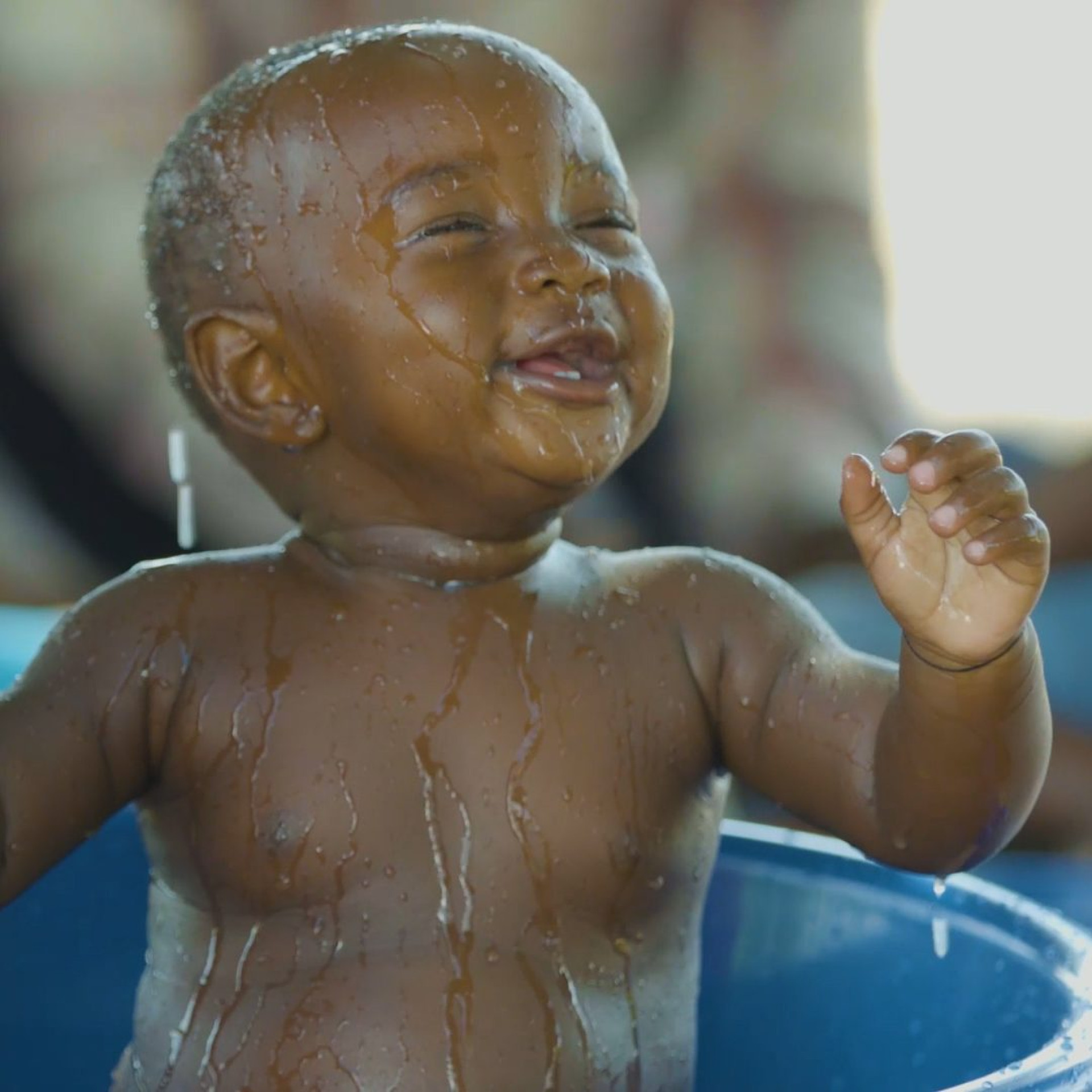 Still image of baby from ECD film series produced by DMI