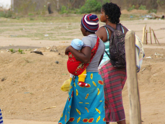 Women walking with babies in Mozambique